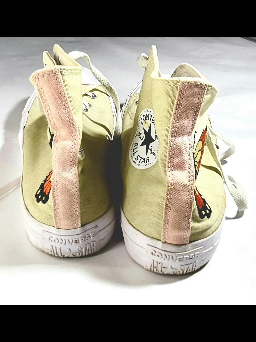 Converse High Top Sneakers in Beige with Orange Butterfly Accent